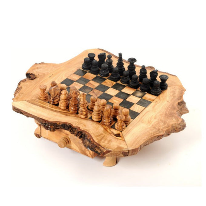 Wooden chess set with checkered board on a white background