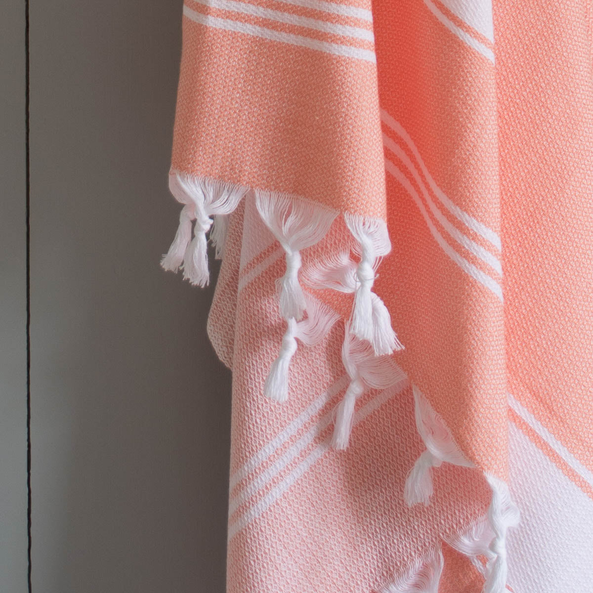 Fouta towel orange - handmade Turkish cotton beach towel
Orange fouta hammam towel folded - lightweight quick-dry beach towel
